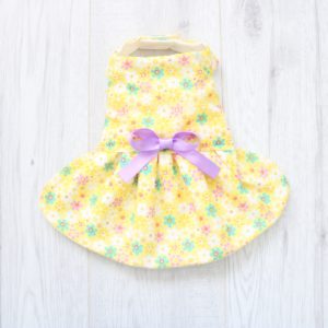 yellow floral dog dress with purple ribbons