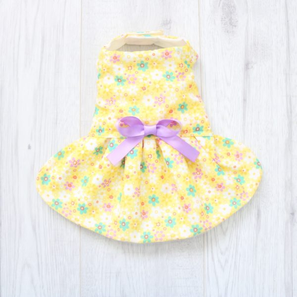 yellow floral dog dress with purple ribbons